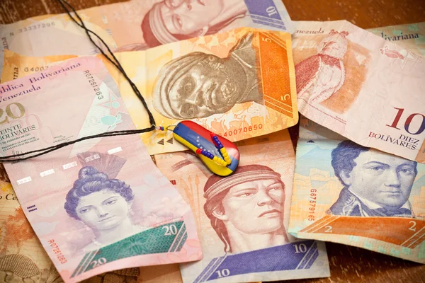 National currency of Venezuela - Bolivar. Suspension - souvenir, painted in the colors of the flag of Venezuela