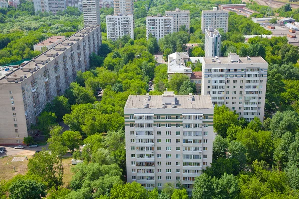 Residential area in a clean area of the city. Dwelling houses among the trees