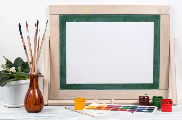 Frame for painting on a wooden table