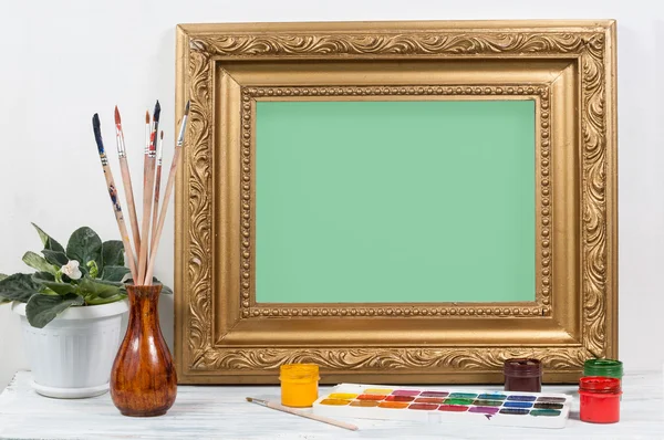Frame for painting on a wooden table