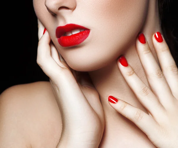 Close-up portrait of woman with beautiful face - isolated on black. Skin care concept.