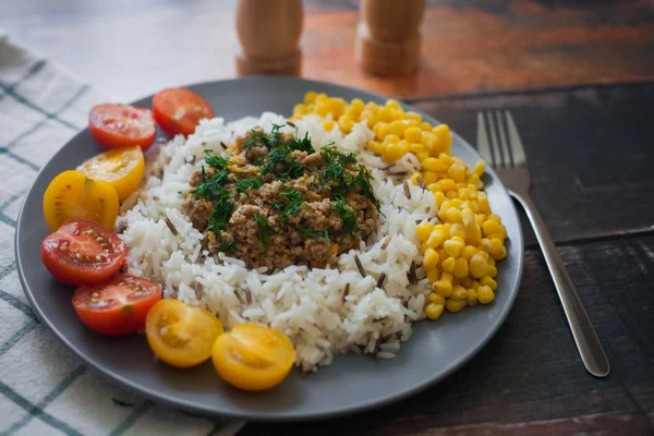 Beef stew with vegetables with rice and tomatoes, healthy eating