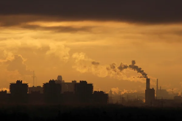 Industrial sunset at sunset sky