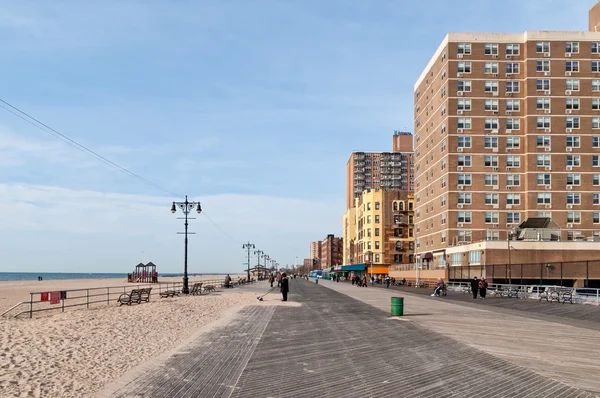 People taking the sun at Brighton Beach in Brooklyn NY