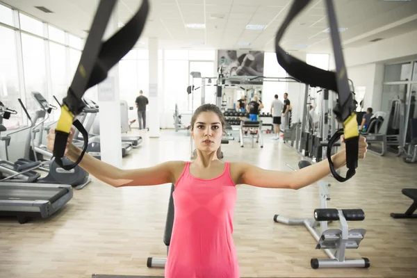 Woman doing push ups training arms