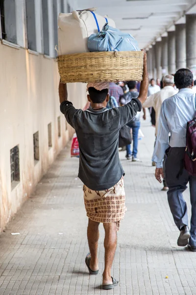 Man carrying weight