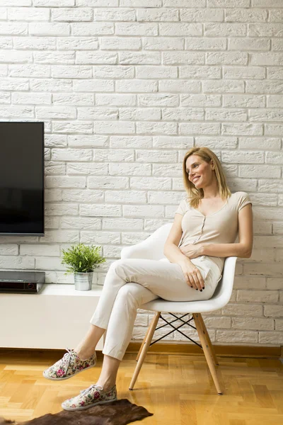 Young woman in the chair