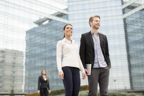 Business people in front of the building