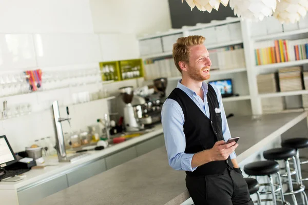 Young businessman with phone