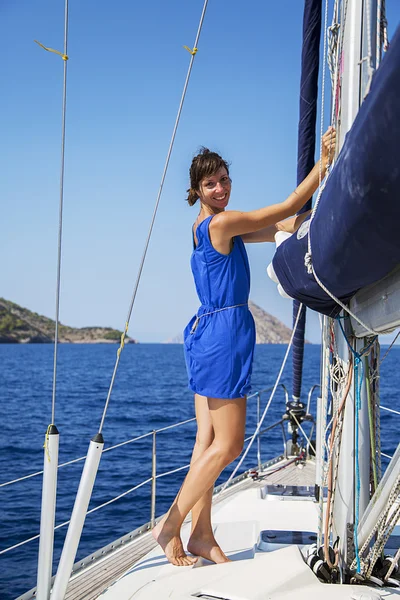 Young woman on sailboat