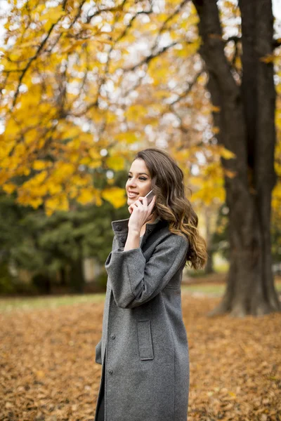 Young woman with mobile phone