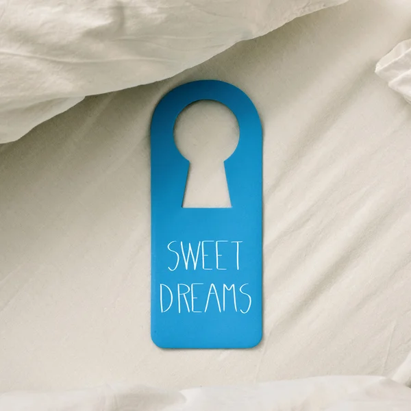 Text sweet dreams in a door hanger