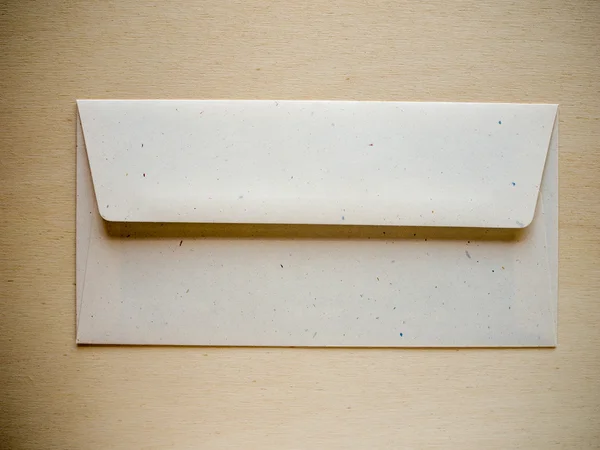 Letter envelope on wood table