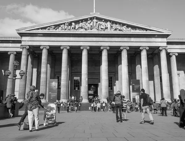 Tourists at British Museum in London in black and white