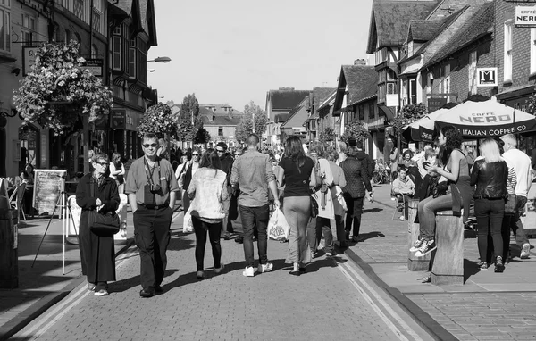 Tourists visiting Stratford upon Avon in black and white