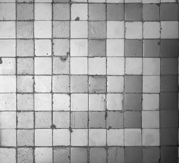 Blue and white mosaic floor background in black and white