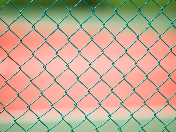 Wire fence with blur playground