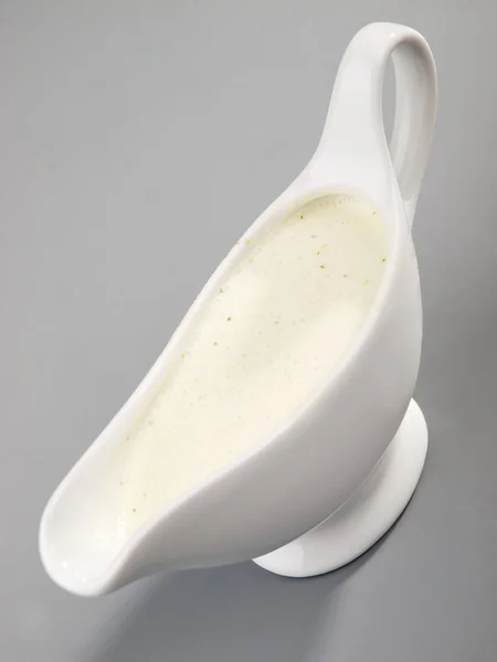 Mayonnaise sauce in gravy boat