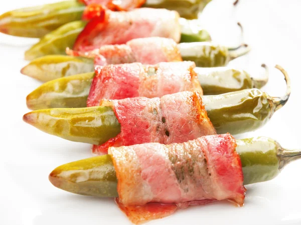 Grilled jalapenos wrapped in bacon