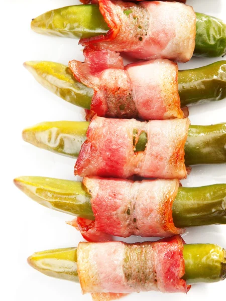 Grilled jalapenos wrapped in bacon