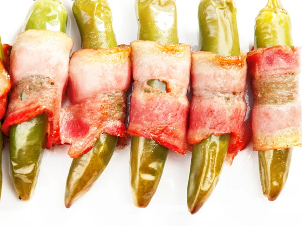 Grilled jalapenos wrapped in bacon