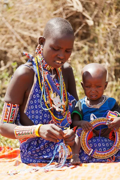 Woman  with handmade jewelry  in Kenya