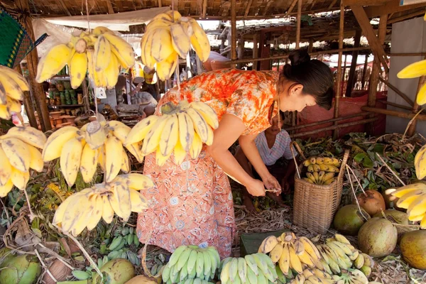 Burmese woman selling bananas