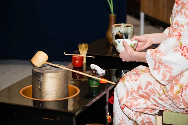Japanese tea ceremony is perfomed by tea master (shallow DOF)