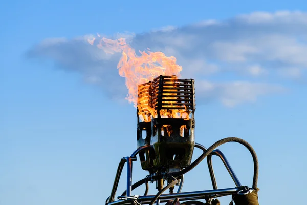 Gas burner with fire to the balloon close-up