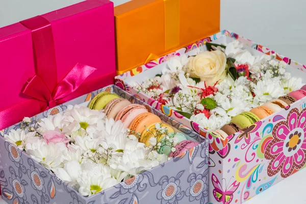 Closeup of  Flowers and macaroon in the box (Shallow depth of fi