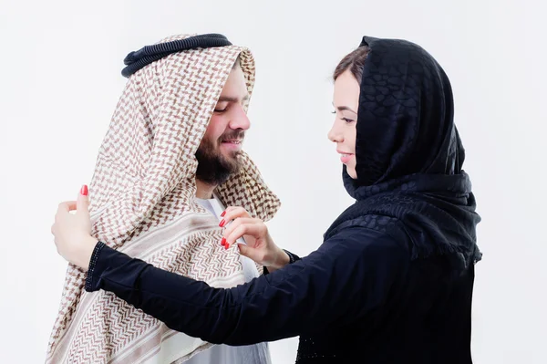 Portrait of attractive arabic couple,dressed middle eastern way.