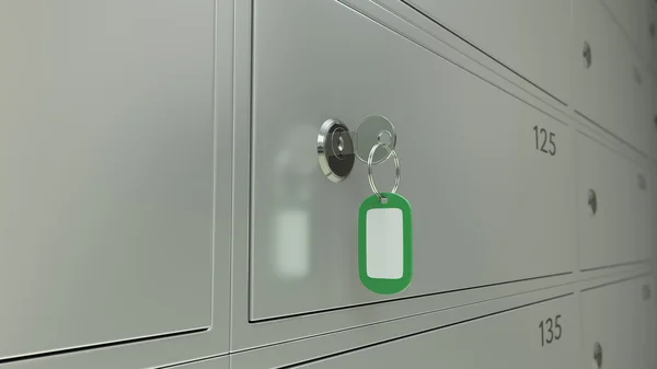 Safe deposit boxes in a bank and the key with freen tag. Shallow focus, CGI