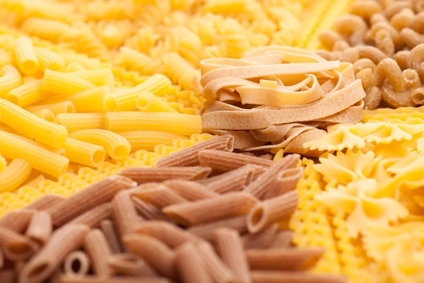Assortment of italian pasta, five different varieties separated