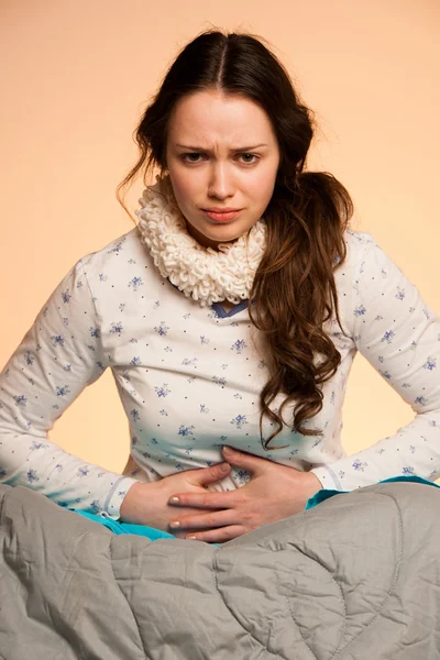 Asian caucasian woman with pain in her stomcah - when belly hurt