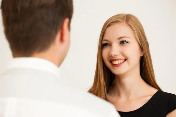 Man and woman on business meeting, sitting in the office, discus