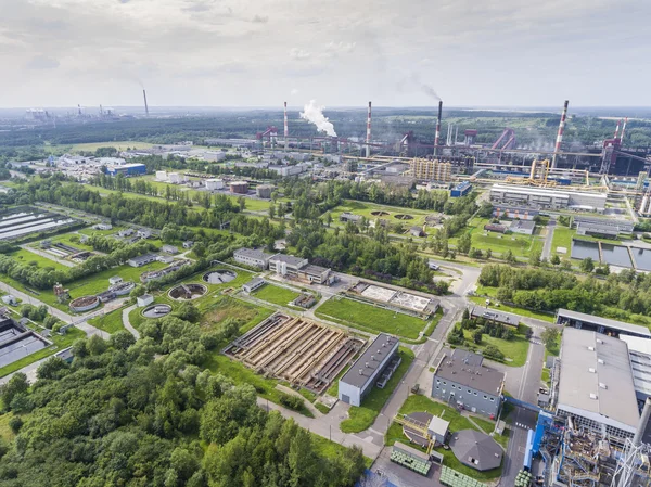 Steel factory with smokestacks at suny day.Metallurgical plant.