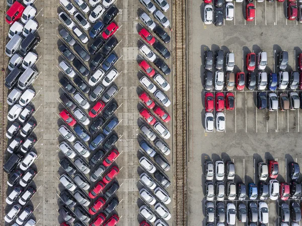 Aerial view lot of vehicles on parking for new car.