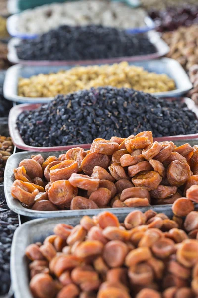 Dry fruits and spices like cashews, raisins, cloves, anise, etc.