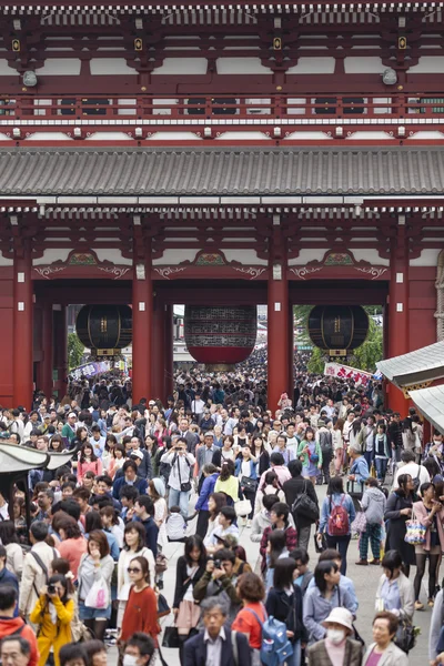 TOKYO, JAPAN -MAY 2: Crowd of japanese people walking around the
