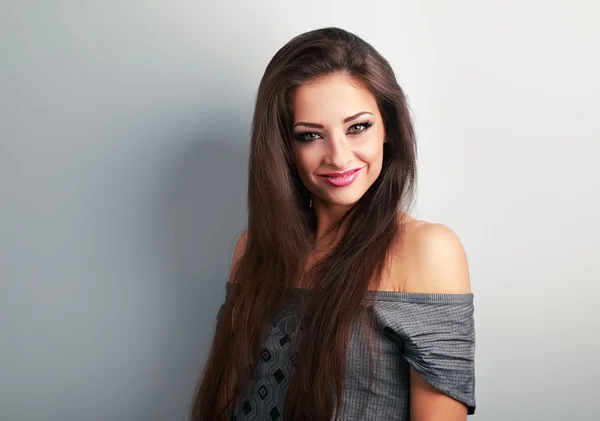 Beautiful makeup woman with long brown hair looking happy
