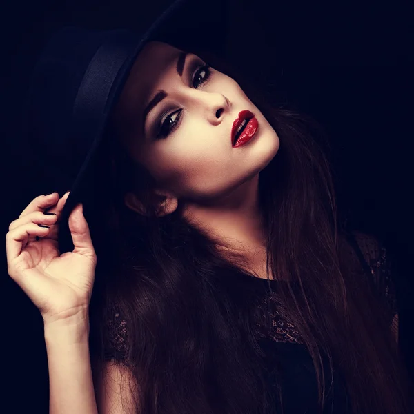 Beautiful seductive bright makeup lady with red hot lips posing