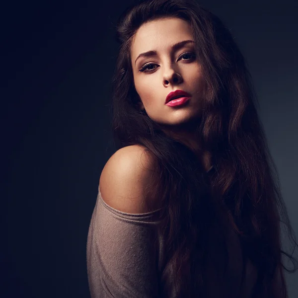 Sexy long hair woman with hot pink lips on dark