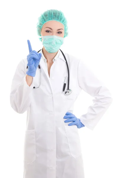 Young woman doctor in surgeon mask, cap and rubber gloves isolat