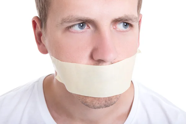 Man with tape over his mouth isolated on white