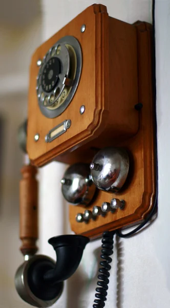 Vintage phone hanging on the wall