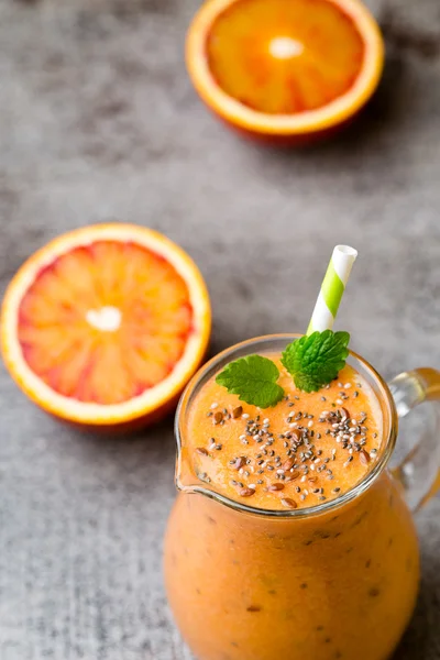 Red Orange Smoothie, decor mint leaves.