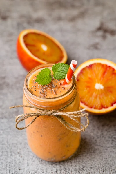 Red Orange Smoothie, decor mint leaves.