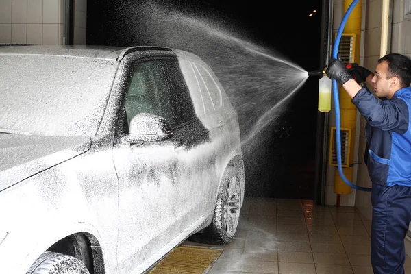 Car service. Washing of a car high pressure