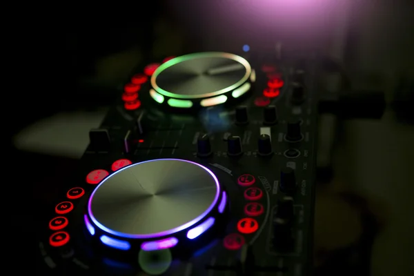 DJ console music party in nightclub