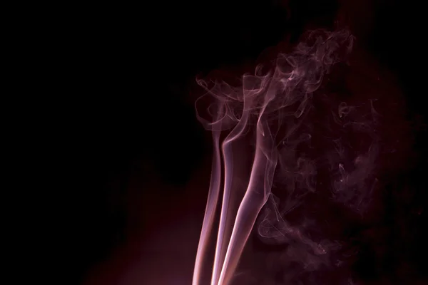 Abstract red smoke on black